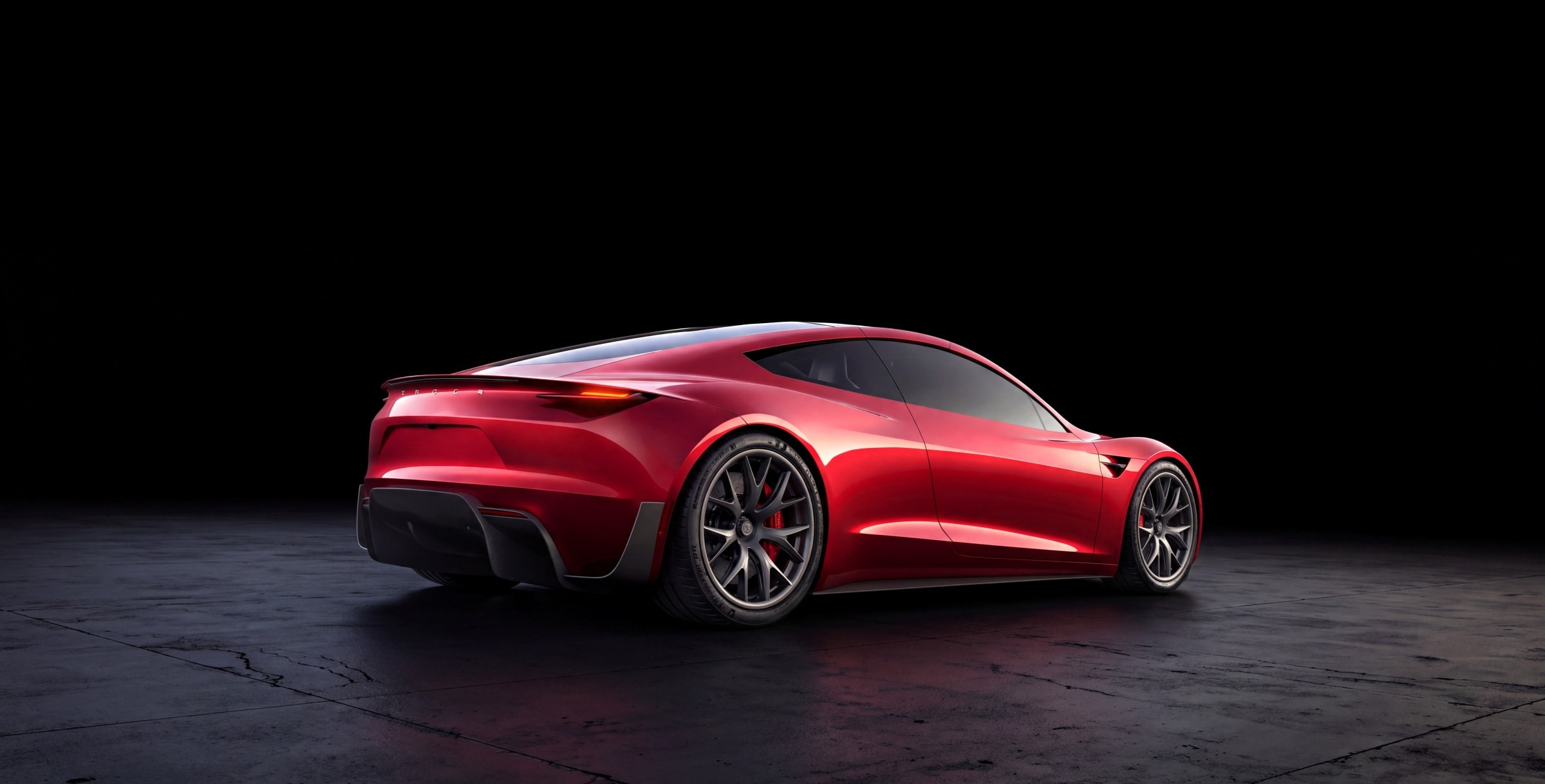 Red electric sports car serviced at Electric Motor Auto Maint